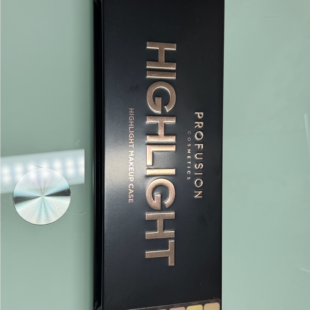 Profusion Cosmetics Black and Gold Highlight Palette